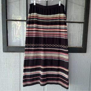 Foxcroft sweater skirt, black with multicolored patterns, elastic waist, 4% wool